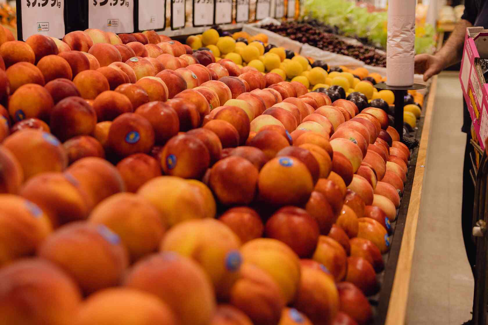 Display of stonefruit - peaches, nectarines, plums and cherries.